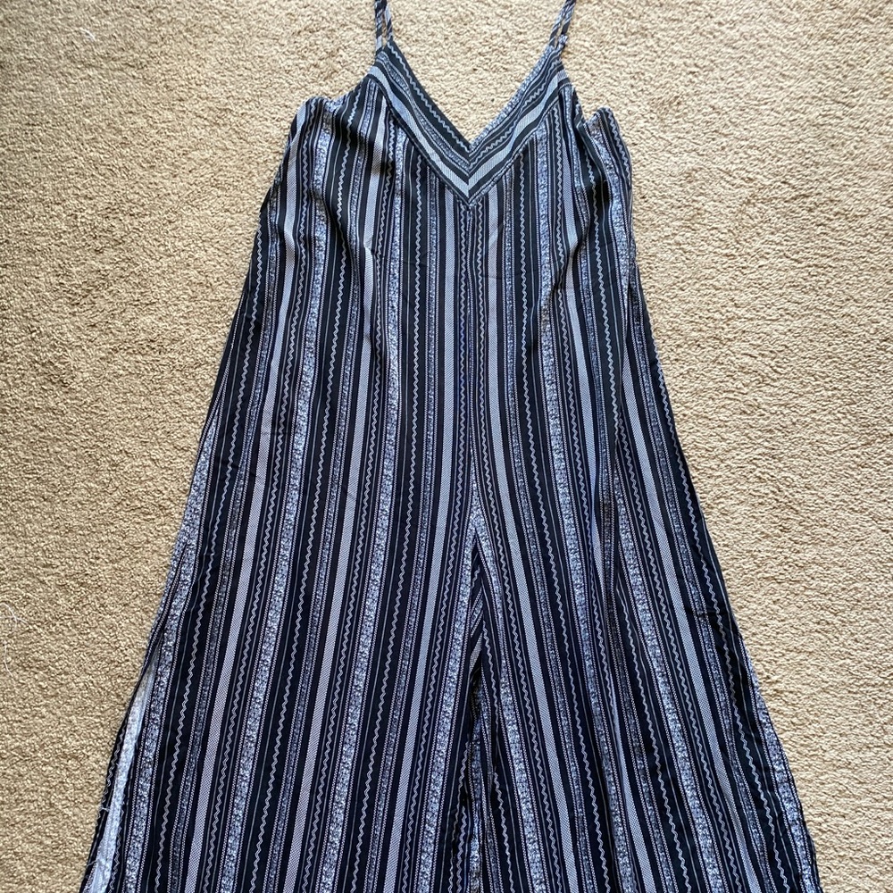 Black and white pinstripe jumpsuit. Wide leg.